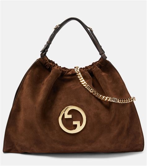 gucci bag in dubai price|Gucci brown suede hobo bag.